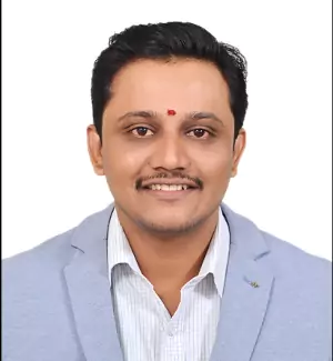 An Image of “Director of SIMS Bangalore”